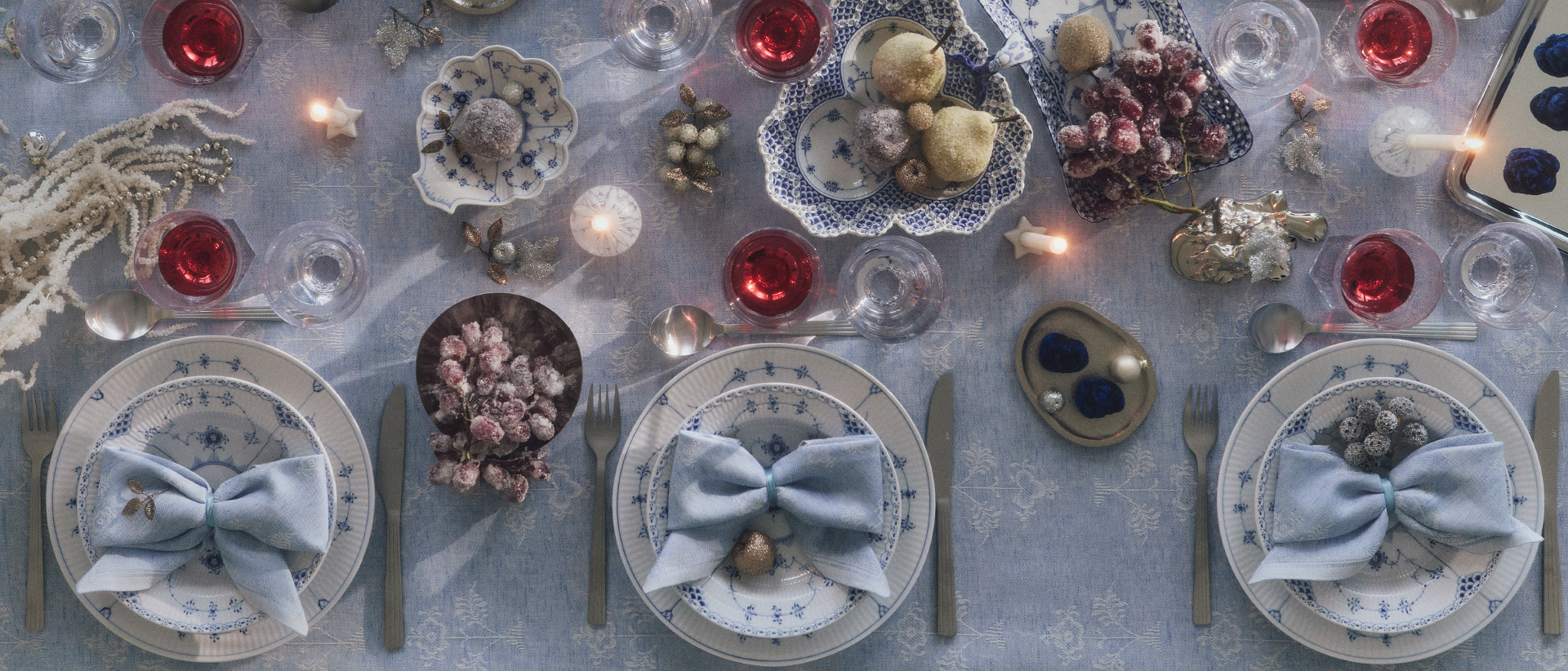 A beautifully set table with pieces from Blue Fluted Plain, Blue Fluted Half Lace and Full Lace.